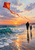 Parent and child walking hand in hand at the shoreline beneath a red-orange kite at sunset.