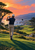 Golfer seen from behind in a post-swing pose on a coastal course, with a club across the shoulders, curving green fairway, distant flag, cliffs, and coral sunset sky.
