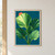 Five broad green leaves fanning upward across a deep teal background, with a partly hidden coral-orange sun and narrow white margin.; frame shown for styling only