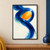 Broad dark blue painted ribbon loops around a bright orange-yellow oval opening and sweeps toward the lower edge on an ivory background.; frame shown for styling only
