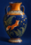 Cobalt amphora with twin handles and an orange shoulder, decorated with ferns and a leaping fox among golden lights.