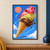 Diagonal waffle cone with three twisting raspberry, pistachio, and chocolate gelato scoops, surrounded by berries and mint-green arcs.; frame shown for styling only