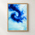 A deep-blue pigment cloud curls around a pale opening and branches into wisps and bubbles against a pale aqua field.; frame shown for styling only