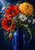 Dense bouquet of red poppies, a large golden flower, white blossoms, and wet green leaves in a cobalt-blue vase.