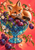 Red-orange fox above purple plums in a blue glass pedestal bowl, surrounded by blossom branches against a coral background.