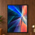 Abstract triangular planes in cobalt, teal, violet, silver, coral, and peach radiate toward a bright convergence point slightly right of center.; frame shown for styling only