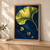 Large golden ginkgo leaf with radiating veins and three smaller falling leaves against a dark navy background.; frame shown for styling only