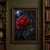 A large deep-red rose covered in droplets, with glossy leaves and smaller buds beside a dark garden trellis under a bright moon.; frame shown for styling only