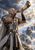 Bearded armored figure blowing a large horn before a luminous city and rainbow bridge.