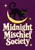 Black cat with yellow eyes and a looping tail walking across a yellow crescent moon above cream Midnight Mischief Society lettering on a plum-purple background.