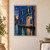 Cobalt-blue canal façade with a coral doorway, glowing arched windows, and colorful reflections in the water.; frame shown for styling only
