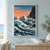 Ochre-sailed wooden fishing boat riding choppy blue water beside a dark rocky headland under a coral dawn sky.; frame shown for styling only