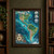 Decorative map of North and South America with turquoise ocean currents, a red-sailed schooner, compass medallion and bird vignettes.; frame shown for styling only