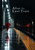 Red umbrella beside the yellow edge of an empty, wet subway platform, with red light streaks receding into a dark tunnel and the title After the Last Train above.