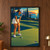 Woman golfer in a white cap and outfit addressing a ball with her putter on a green at coastal sunset.; frame shown for styling only