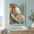Red-haired woman in a teal outfit reclining in an open shell among fish and sea plants.; frame shown for styling only