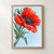 Large scarlet poppy with dark center and dangling raindrop, beside a green bud and leaves on a pale-blue background.; frame shown for styling only