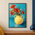 Pale-yellow two-handled pitcher filled with red poppies, white daisies, and blue-green leaves on a turquoise tabletop and backdrop.; frame shown for styling only