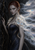 A red-haired, pointed-eared dark elf in a dark gold-trimmed gown stands against rock beside a luminous iridescent cloudlike mantle.