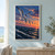 Six seabirds fly in formation above rough blue ocean waves beneath a coral-orange sunset.; frame shown for styling only
