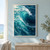 Large turquoise-blue ocean wave curling around a dark trough, with a bright white foamy crest and scattered reflections.; frame shown for styling only