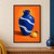 Cobalt-blue ceramic vessel with flowing pale wavy bands beside a yellow citrus fruit and green leaf on orange.; frame shown for styling only