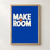 Cream MAKE ROOM capitals on a deep blue ground, with a small orange starburst between the two lines and open space below.; frame shown for styling only
