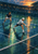 Two adult male tennis players on a wet teal court at sunset; the front player lunges toward a yellow ball while his partner stands behind.