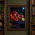Split pomegranate with ruby seeds, whole pomegranates, lime and leafy sprig on indigo cloth beneath a moon.; frame shown for styling only