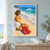 An adult woman in a chartreuse swimsuit sits on the beach holding red swim fins and gazing at a curling turquoise wave.; frame shown for styling only