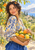 Dark-haired woman in a blue-and-white patterned blouse holding a basket of lemons and oranges beneath citrus branches.