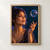 Portrait of a woman watching an iridescent soap bubble above her raised hand against a deep teal background.; frame shown for styling only