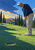 Golfer in a white cap and navy top bends over a putter on a sunlit green near a ball and cup, with cypress trees and hills beyond.