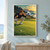 Crouching golfer reading a putt on a coastal green, with ball and putter in front and a red flag, rocks, and surf behind.; frame shown for styling only