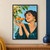 Smiling woman in a teal blouse holding a patterned bowl of mandarins among leafy citrus branches and white blossoms.; frame shown for styling only