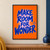 Blue hand-painted words “MAKE ROOM FOR WONDER” on orange, with a yellow starburst inside the O and three blue accent strokes.; frame shown for styling only