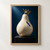 Glossy ivory porcelain pear with a tilted jeweled crown and cobalt-blue glaze fissure on a dark plinth against a deep blue background.; frame shown for styling only
