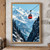 Scarlet cable car suspended above a snowy alpine valley with fir-covered slopes and turquoise water below.; frame shown for styling only