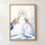 Two hands clink clear stemmed glasses with citrus slices above a table holding a clear bottle and folded napkin.; frame shown for styling only