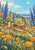 Brown hare leaping horizontally through a green meadow of blue flowers and orange poppies, with distant hills and pale blue sky.