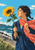 Adult woman holding a large sunflower and gathering a streaming coral scarf by the sea, with rocky surf, seawall, and grasses.
