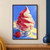 Pink and ivory soft-serve spiral in a clear glass pedestal dish, with a raspberry nearby against a blue background.; frame shown for styling only