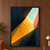 Upward view of angular saffron, ink-blue, and coral planes opening onto pale mint-blue sky.; frame shown for styling only