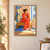 Adult woman in a coral-red suit sits on an ochre bench with citrus water beside a lemon bowl, mirror, and bright window.; frame shown for styling only