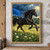 Black horse with streaming mane in a flowered meadow, lit by golden sunlight beneath storm clouds beside a vivid blue rain curtain.; frame shown for styling only