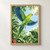 A green parakeet with a yellow face and blue-green wings spreads its wings above a branch amid tropical foliage and a red flower.; frame shown for styling only