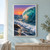 A large turquoise wave curls over foamy surf beside a small dark rock, beneath an orange-pink sunset sky.; frame shown for styling only