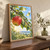 Leafy apple branch bearing a red-and-gold apple and a smaller green apple against blue sky and distant countryside.; frame shown for styling only