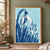 White snowdrop blooms and long leaves in dark ultramarine on a pale aqua ground, with small rain marks.; frame shown for styling only