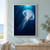 Translucent moon jelly with pink inner forms drifting through deep blue water beneath turquoise light rays.; frame shown for styling only